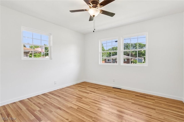 178 Lindsey Rd, Munroe Falls, OH 44262 - empty room featuring baseboards, light wood-style flooring, and ceiling fan