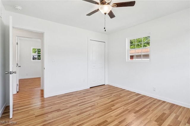 178 Lindsey Rd, Munroe Falls, OH 44262 - unfurnished room featuring light wood-type flooring, a smoke detector, ceiling fan, and baseboards