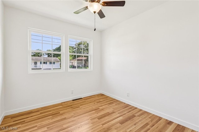 178 Lindsey Rd, Munroe Falls, OH 44262 - empty room featuring baseboards, light wood finished floors, and ceiling fan