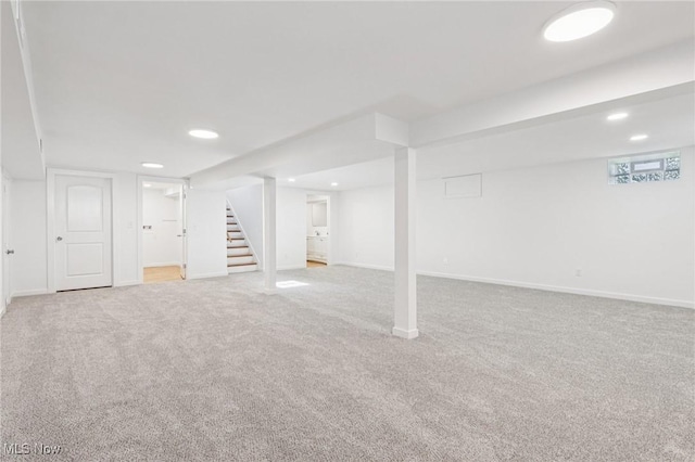 178 Lindsey Rd, Munroe Falls, OH 44262 - finished below grade area with light colored carpet, stairway, baseboards, and recessed lighting