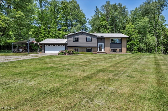 11996 Bower Rd, Minerva, OH 44657 - raised ranch featuring driveway, a front yard, a garage, and a carport