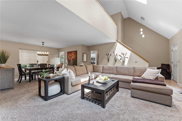 10378 N Pond Ln N Unit 2, Twinsburg, OH 44087 - living room featuring a chandelier, carpet flooring, and vaulted ceiling