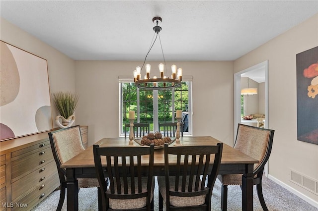 10378 N Pond Ln N Unit 2, Twinsburg, OH 44087 - dining area with carpet, a chandelier, and baseboards