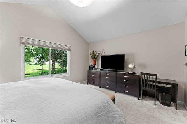 10378 N Pond Ln N Unit 2, Twinsburg, OH 44087 - bedroom featuring lofted ceiling, light colored carpet, and baseboards