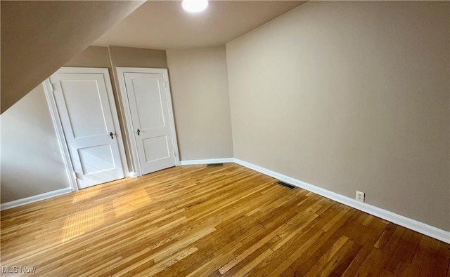 19627 Winslow Rd, Shaker Heights, OH 44122 - bonus room with baseboards and light wood-style floors