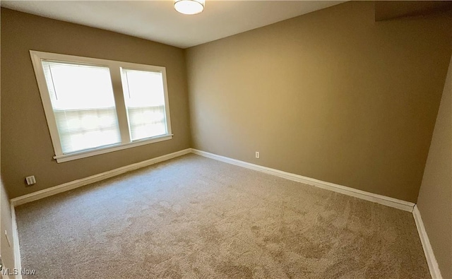 19627 Winslow Rd, Shaker Heights, OH 44122 - spare room featuring carpet flooring and baseboards