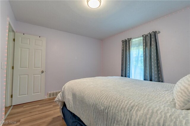 14222 Wade Ave NE, Hartville, OH 44632 - bedroom featuring light wood-type flooring