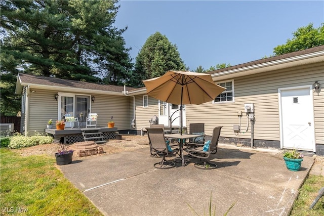 14222 Wade Ave NE, Hartville, OH 44632 - view of patio / terrace with a deck and outdoor dining space