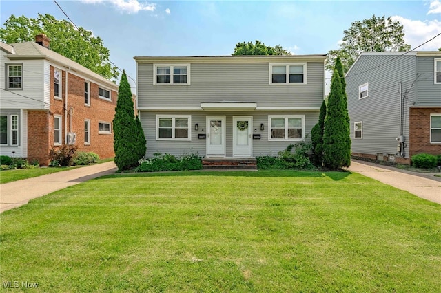 3357-3359 Rocky River Dr, Cleveland, OH 44111 - colonial house featuring a front lawn
