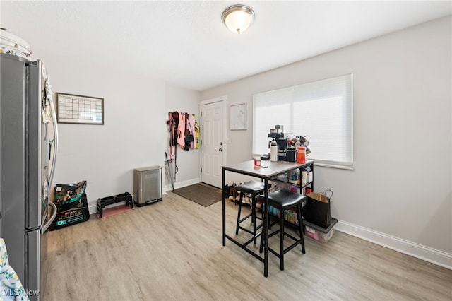 3357-3359 Rocky River Dr, Cleveland, OH 44111 - dining area featuring light wood-type flooring and baseboards