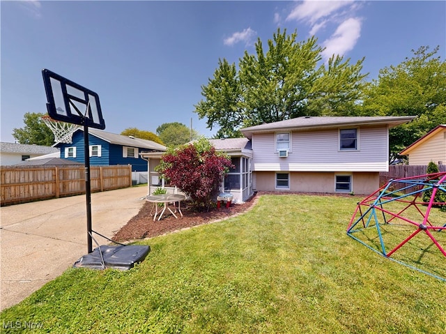 7570 Dahlia Dr, Mentor-On-The-Lake, OH 44060 - rear view of house with a sunroom