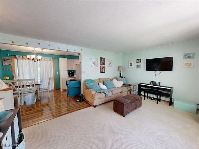 7570 Dahlia Dr, Mentor-On-The-Lake, OH 44060 - carpeted living room featuring a chandelier and wood finished floors