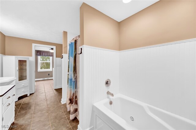 23789 Snell Rd, Columbia Station, OH 44028 - full bathroom with wainscoting, vanity, and tile patterned flooring
