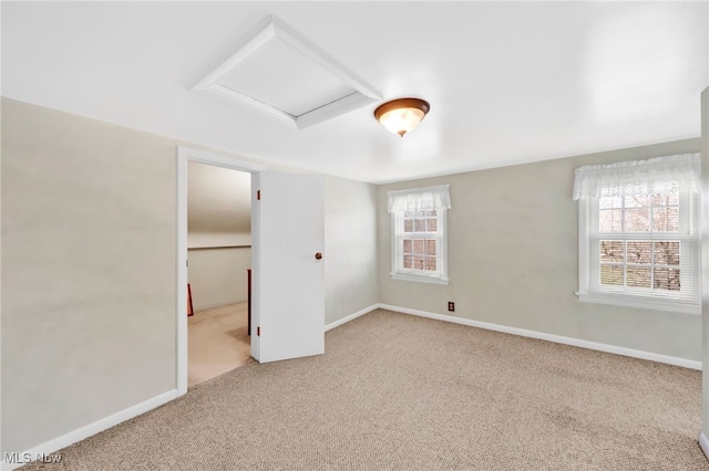 23789 Snell Rd, Columbia Station, OH 44028 - unfurnished bedroom featuring carpet floors, attic access, and baseboards