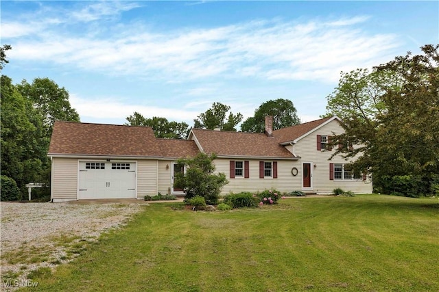 23789 Snell Rd, Columbia Station, OH 44028 - view of front of house featuring an attached garage, a chimney, driveway, and a front yard