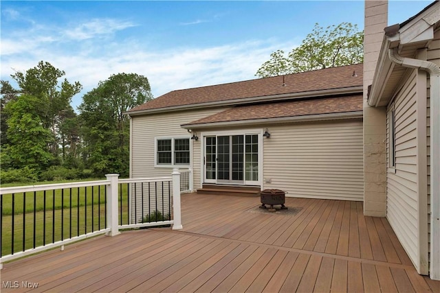 23789 Snell Rd, Columbia Station, OH 44028 - wooden deck featuring an outdoor fire pit and a lawn
