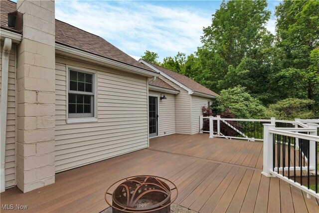 23789 Snell Rd, Columbia Station, OH 44028 - wooden deck featuring an outdoor fire pit