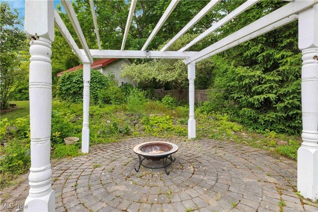 23789 Snell Rd, Columbia Station, OH 44028 - view of patio with a pergola and an outdoor fire pit