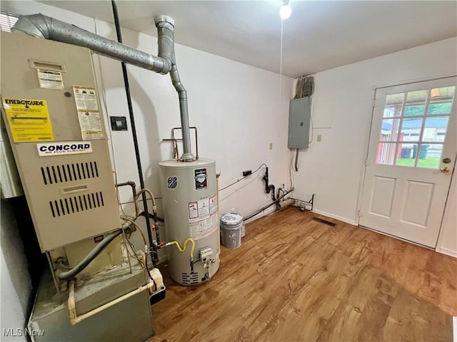 818 2nd St, Brilliant, OH 43913 - utilities featuring water heater, electric panel, and heating unit