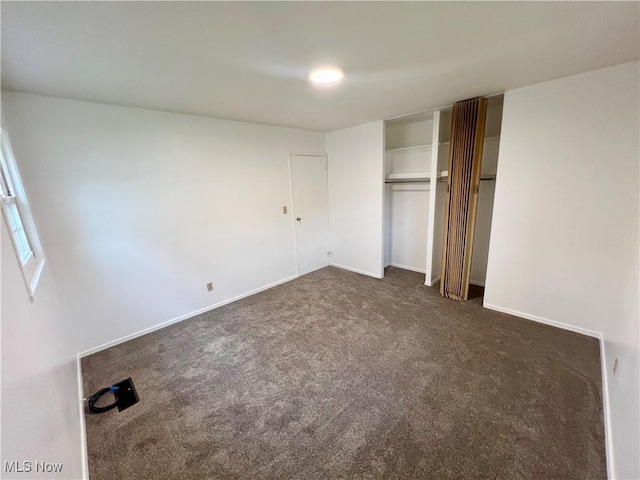 818 2nd St, Brilliant, OH 43913 - unfurnished bedroom with carpet, a closet, and baseboards
