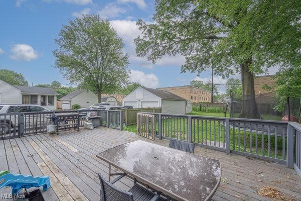 23 Sprague Rd, Berea, OH 44017 - wooden terrace featuring outdoor dining area and a residential view