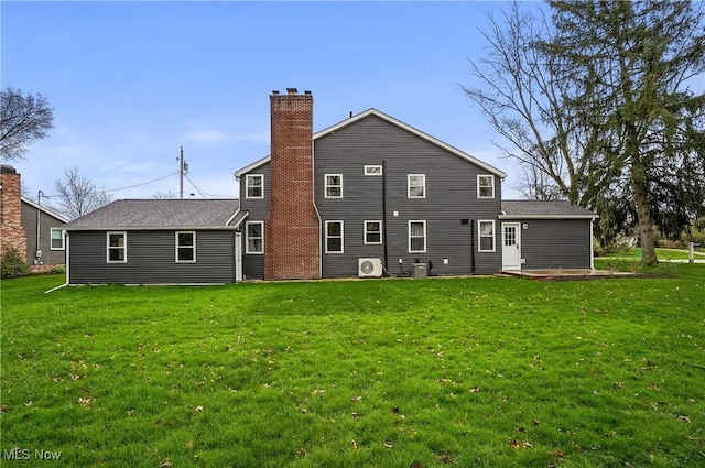 5433 Fleetwood Ave NW, Canton, OH 44718 - rear view of property with a lawn, a chimney, ac unit, and central air condition unit
