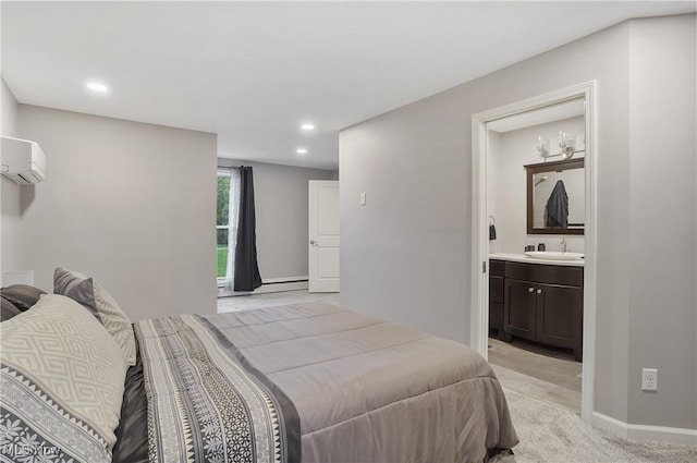 5433 Fleetwood Ave NW, Canton, OH 44718 - bedroom featuring a sink, a wall mounted air conditioner, ensuite bath, recessed lighting, and baseboards