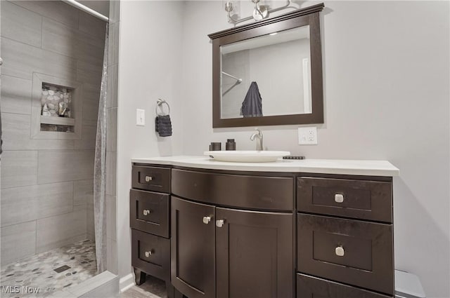 5433 Fleetwood Ave NW, Canton, OH 44718 - bathroom featuring a tile shower and vanity