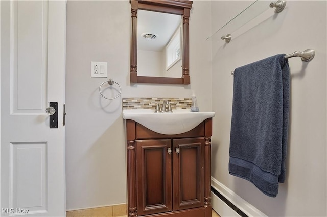 5433 Fleetwood Ave NW, Canton, OH 44718 - bathroom with vanity and tasteful backsplash