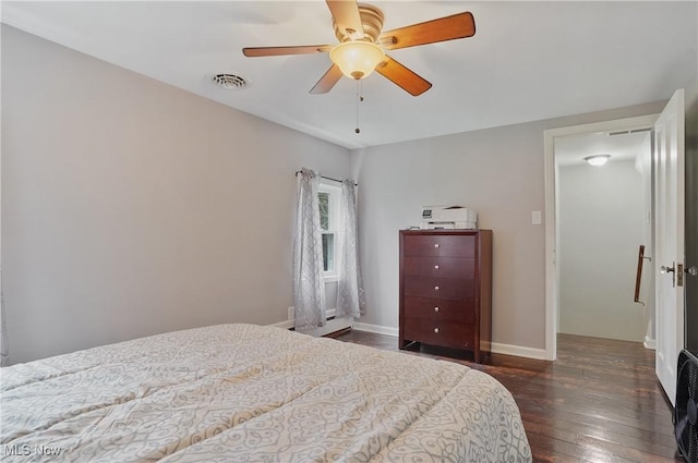5433 Fleetwood Ave NW, Canton, OH 44718 - bedroom featuring wood-type flooring, baseboards, and a ceiling fan