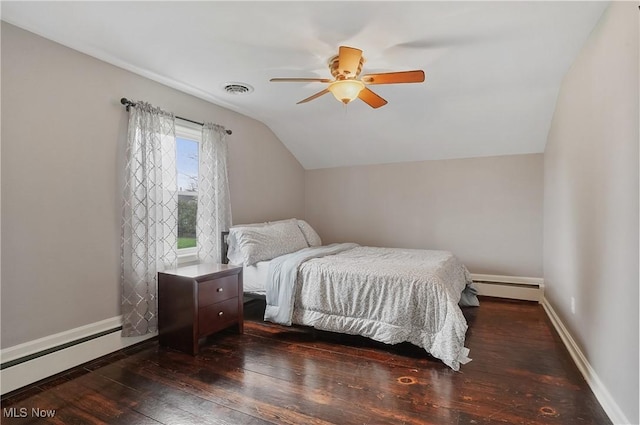5433 Fleetwood Ave NW, Canton, OH 44718 - bedroom featuring vaulted ceiling, hardwood / wood-style floors, a baseboard radiator, baseboards, and ceiling fan