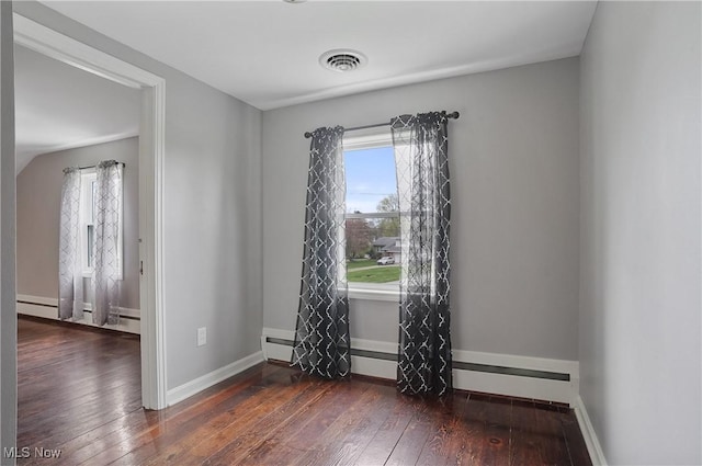5433 Fleetwood Ave NW, Canton, OH 44718 - unfurnished room featuring hardwood / wood-style flooring, baseboards, and baseboard heating