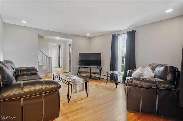 5433 Fleetwood Ave NW, Canton, OH 44718 - living room featuring light wood-style floors, stairs, and recessed lighting
