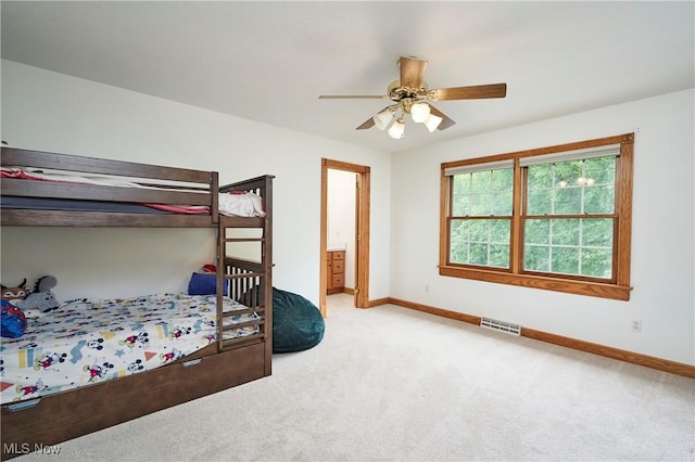 5968 Winchell Rd, Hiram, OH 44234 - carpeted bedroom with baseboards, a ceiling fan, and connected bathroom