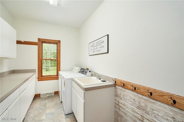 5968 Winchell Rd, Hiram, OH 44234 - laundry room featuring washing machine and clothes dryer, cabinet space, and baseboards