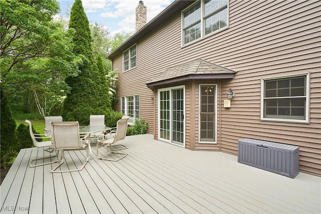 5968 Winchell Rd, Hiram, OH 44234 - wooden deck with outdoor dining area