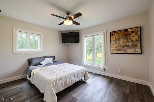 6268 Summers Rd, Windsor, OH 44099 - bedroom featuring baseboards, dark wood-type flooring, and a ceiling fan