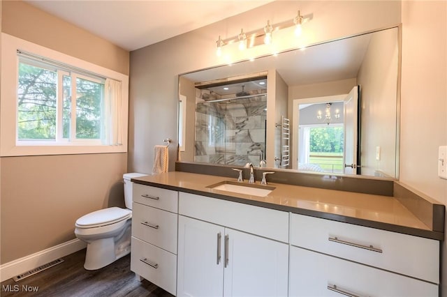 6268 Summers Rd, Windsor, OH 44099 - full bathroom featuring toilet, a shower stall, vanity, baseboards, and wood finished floors