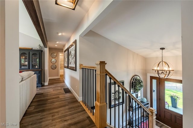 6268 Summers Rd, Windsor, OH 44099 - corridor featuring dark wood-style floors, a chandelier, lofted ceiling, baseboards, and stairway