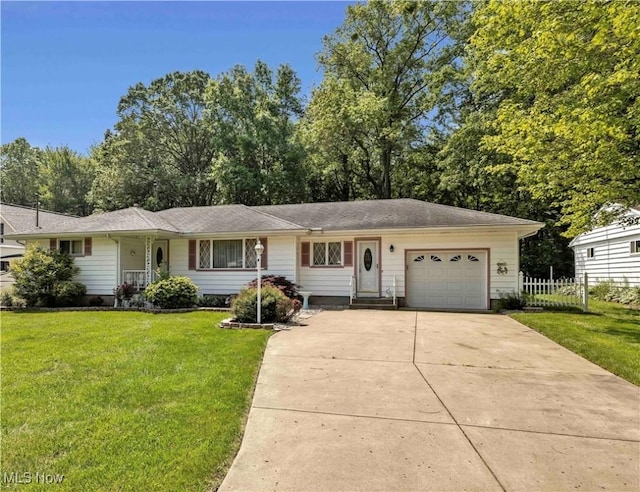 3622 Valacamp Ave SE, Warren, OH 44484 - view of front facade with an attached garage and driveway