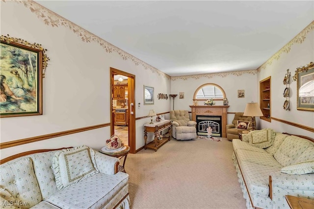 3622 Valacamp Ave SE, Warren, OH 44484 - living area featuring carpet flooring and a fireplace