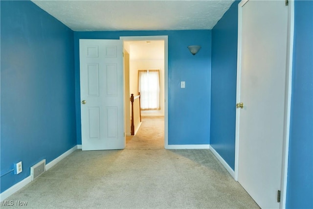 895 Elmwood Dr, Hubbard, OH 44425 - unfurnished bedroom featuring carpet floors and baseboards