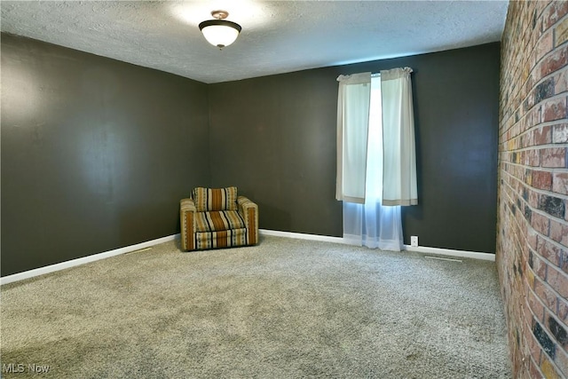 895 Elmwood Dr, Hubbard, OH 44425 - unfurnished room featuring a textured ceiling, carpet flooring, and baseboards