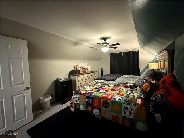 20007 Sunset Dr, Warrensville Heights, OH 44122 - carpeted bedroom with lofted ceiling and ceiling fan