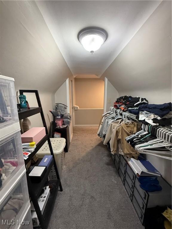 20007 Sunset Dr, Warrensville Heights, OH 44122 - walk in closet with carpet and lofted ceiling