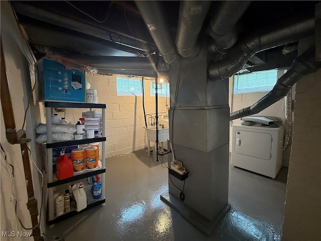 20007 Sunset Dr, Warrensville Heights, OH 44122 - below grade area with washer / clothes dryer, a sink, and heating unit