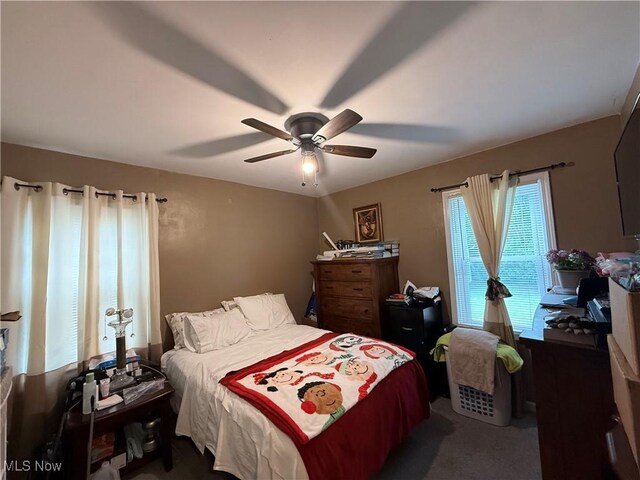 20007 Sunset Dr, Warrensville Heights, OH 44122 - bedroom featuring a ceiling fan and carpet floors