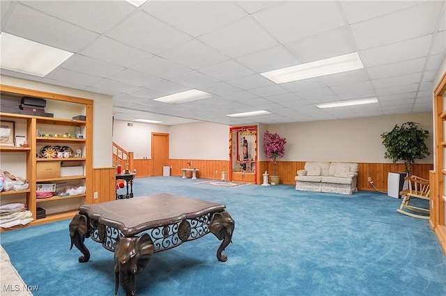 8650 Hidden Hills Dr SE, Howland, OH 44484 - recreation room with wainscoting, carpet, wooden walls, and a drop ceiling