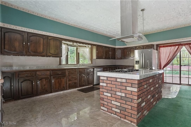 8650 Hidden Hills Dr SE, Howland, OH 44484 - kitchen featuring appliances with stainless steel finishes, a textured ceiling, island exhaust hood, dark brown cabinetry, and light countertops