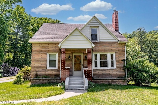 10790 Good Hope Pike, Jane Lew, WV 26378 - bungalow-style house featuring a chimney, a front lawn, and a shingled roof